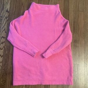 Free People pink funnel sweater.
